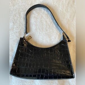 black patent leather shoulder bag